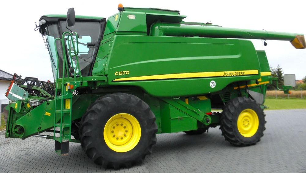 John Deere C 670 2008 Rok, heder 7,6m, 1900 mtg, Nie Malowany, Stan Idealny - Combine harvester: picture 1 John Deere C 670 2008 Rok, heder 7,6m, 1900 mtg, Nie Malowany, Stan Idealny - Combine harvester: picture 1