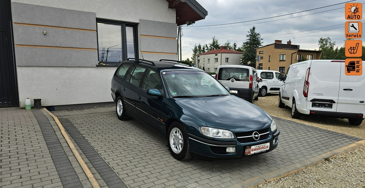 Opel Omega B 2,5 v6 *automat* napęd tył *welury* - Estate car: picture 1 Opel Omega B 2,5 v6 *automat* napęd tył *welury* - Estate car: picture 1