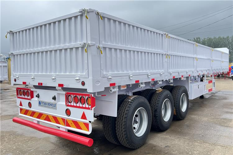 TITAN Tri Axle Dropside Trailer For Sale In Nigeria Lagos - Dropside/ Flatbed semi-trailer: picture 2 TITAN Tri Axle Dropside Trailer For Sale In Nigeria Lagos - Dropside/ Flatbed semi-trailer: picture 2