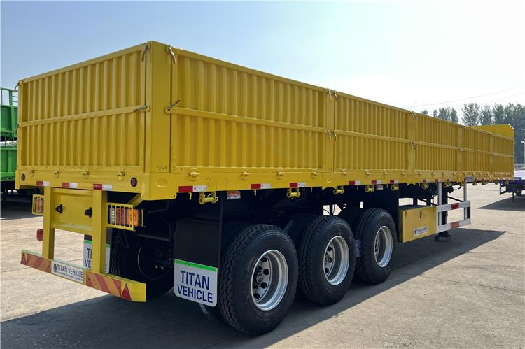 TITAN Triple Axle Trailer with Drop Side Trailer for Sale In Ghana - Dropside/ Flatbed semi-trailer: picture 3 TITAN Triple Axle Trailer with Drop Side Trailer for Sale In Ghana - Dropside/ Flatbed semi-trailer: picture 3