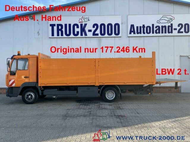 MAN LE10.180 Origi. 177246Km Bordwände 1.20m + LBW2t - Dropside/ Flatbed truck: picture 1 MAN LE10.180 Origi. 177246Km Bordwände 1.20m + LBW2t - Dropside/ Flatbed truck: picture 1