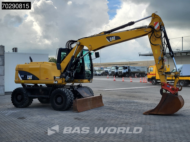 Wheel excavator Caterpillar M313 D: picture 6