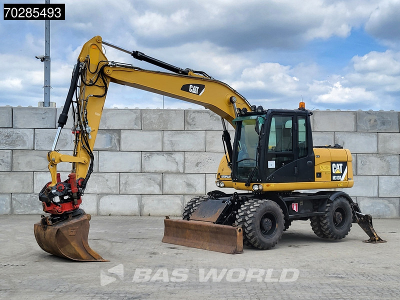 Caterpillar M313 D OUTRIGGERS + ROTOTILT - Wheel excavator: picture 2 Caterpillar M313 D OUTRIGGERS + ROTOTILT - Wheel excavator: picture 2