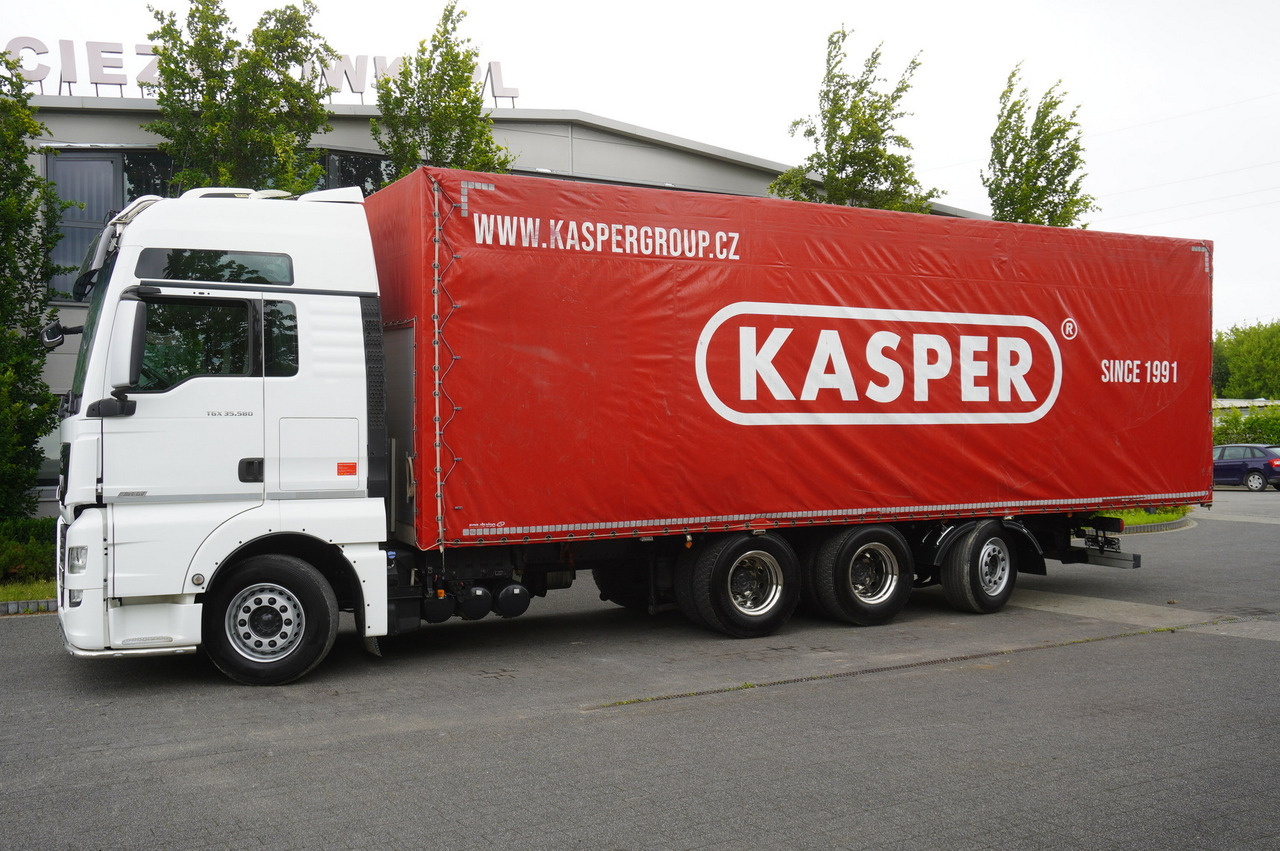MAN TGX 35.580 E6 8x4 /4 / 23 EPAL tarp superstructure / 4th axle steered - Curtain side truck: picture 2 MAN TGX 35.580 E6 8x4 /4 / 23 EPAL tarp superstructure / 4th axle steered - Curtain side truck: picture 2