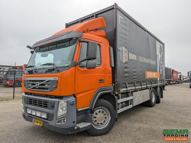 Volvo FM330 6x2/4 Daycab Euro5 EEV - SchuifzeilenBak 6.7m. - KooiAap Aansluiting - HH Vloer - Rongen - Curtain side truck: picture 1 Volvo FM330 6x2/4 Daycab Euro5 EEV - SchuifzeilenBak 6.7m. - KooiAap Aansluiting - HH Vloer - Rongen - Curtain side truck: picture 1