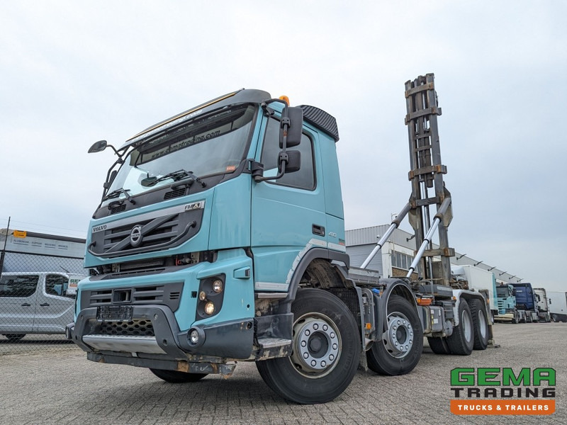 Volvo FMX410 8x4 /4 Daycab Euro5 - Haakarm 25T - CementSilo - RadioGrafisch - Hydr. Steunpoten - NaafReductie - Hook lift truck: picture 1 Volvo FMX410 8x4 /4 Daycab Euro5 - Haakarm 25T - CementSilo - RadioGrafisch - Hydr. Steunpoten - NaafReductie - Hook lift truck: picture 1
