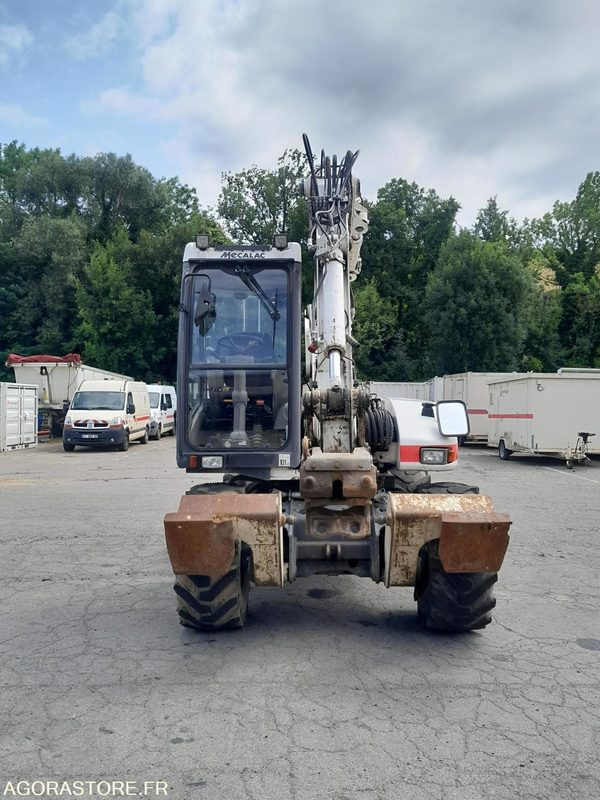 PELLE SUR PNEUS - MECALAC - 12 MTX - 2012 / 11451 HEURES (M4476) - Excavator: picture 2 PELLE SUR PNEUS - MECALAC - 12 MTX - 2012 / 11451 HEURES (M4476) - Excavator: picture 2