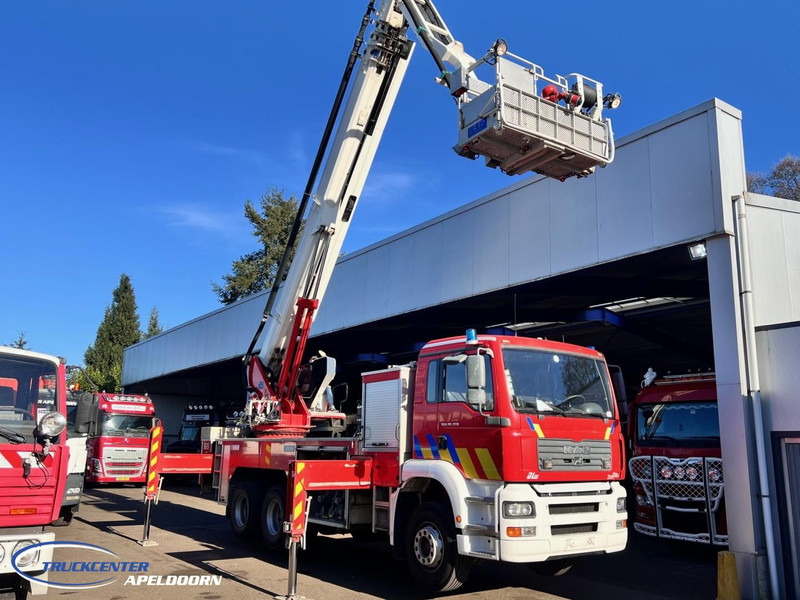 MAN TGA 26.350 Magirus ALP 320L = 32 meter, Waterpomp, 6x4, Bladgeveerd - Fire truck: picture 2 MAN TGA 26.350 Magirus ALP 320L = 32 meter, Waterpomp, 6x4, Bladgeveerd - Fire truck: picture 2