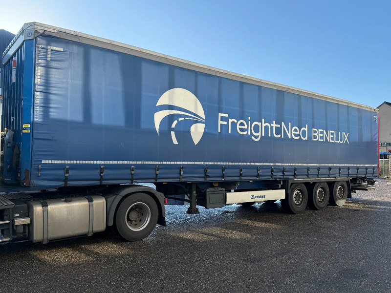 Krone SD - 3 AXLE + SLIDING ROOF + DHOLLANDIA LIFT - Curtainsider semi-trailer: picture 1 Krone SD - 3 AXLE + SLIDING ROOF + DHOLLANDIA LIFT - Curtainsider semi-trailer: picture 1