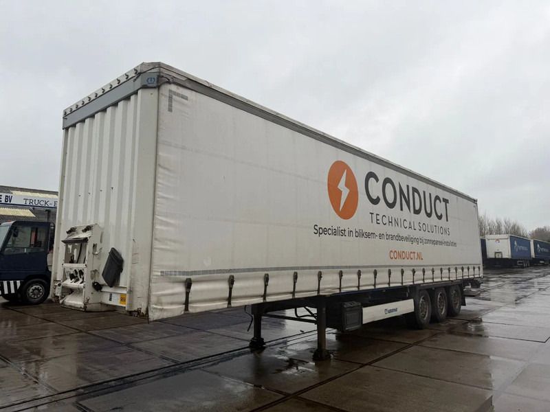 Krone SD DHOLLANDIA 2000 KG 3 AXLE SLIDING ROOF DISC BRAKES - Curtainsider semi-trailer: picture 1 Krone SD DHOLLANDIA 2000 KG 3 AXLE SLIDING ROOF DISC BRAKES - Curtainsider semi-trailer: picture 1