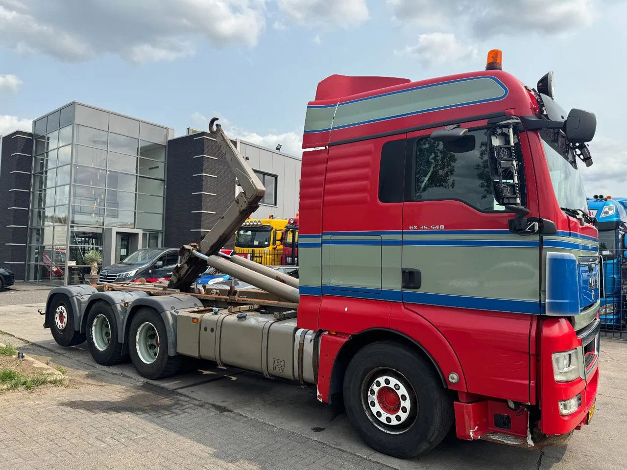MAN TGX 35.540 - 8X4 - EURO 5 + AJK HOOK + LIFT/STEE - Hook lift truck: picture 3 MAN TGX 35.540 - 8X4 - EURO 5 + AJK HOOK + LIFT/STEE - Hook lift truck: picture 3