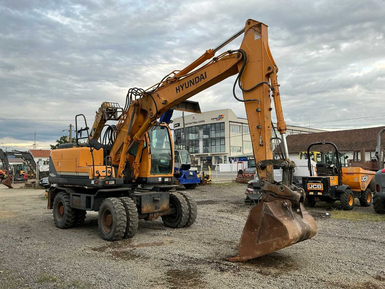 HYUNDAI ROBEX 140W-9 - Wheel excavator: picture 1 HYUNDAI ROBEX 140W-9 - Wheel excavator: picture 1