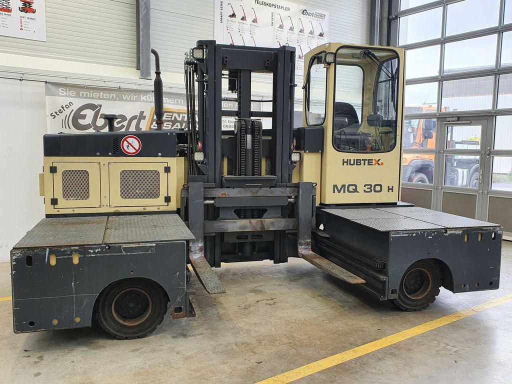 Hubtex MQ 30 H Hybrid / 748h! / Diesel + Elektro Hubtex MQ 30 H Hybrid / 748h! / Diesel + Elektro - Side loader: picture 1 Hubtex MQ 30 H Hybrid / 748h! / Diesel + Elektro Hubtex MQ 30 H Hybrid / 748h! / Diesel + Elektro - Side loader: picture 1
