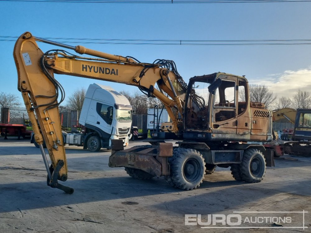 2013 Hyundai ROBEX140W-9 - Wheel excavator: picture 1 2013 Hyundai ROBEX140W-9 - Wheel excavator: picture 1