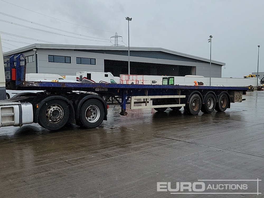 Montracon Tri Axle Flatbed Trailer, Twist Locks - Dropside/ Flatbed semi-trailer: picture 1 Montracon Tri Axle Flatbed Trailer, Twist Locks - Dropside/ Flatbed semi-trailer: picture 1