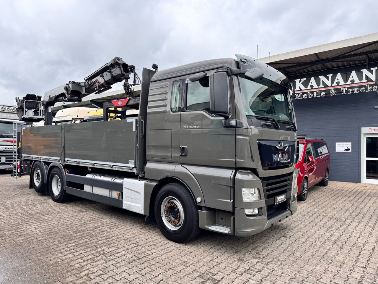 MAN 26.460 TGX Baustoffkran HMF 2110-L3 - Crane truck: picture 1 MAN 26.460 TGX Baustoffkran HMF 2110-L3 - Crane truck: picture 1